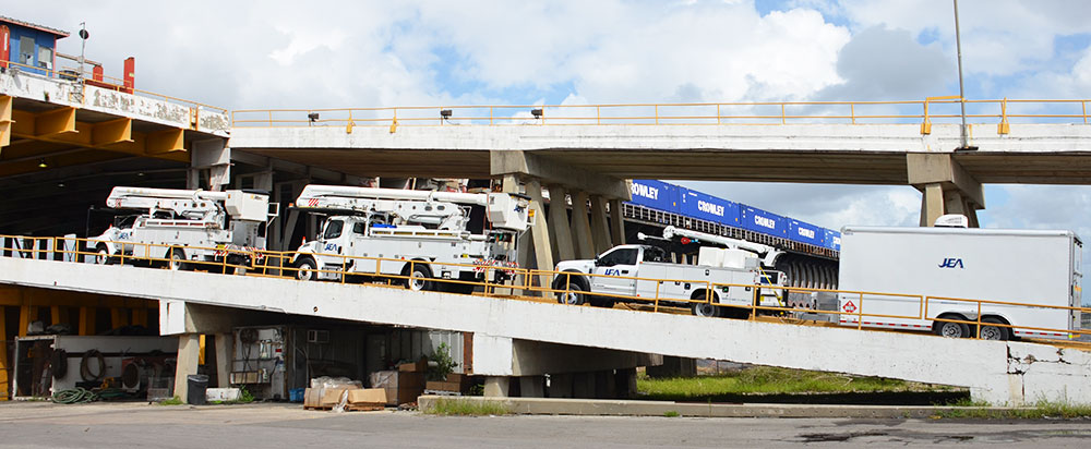 Trucks Boarding Ship