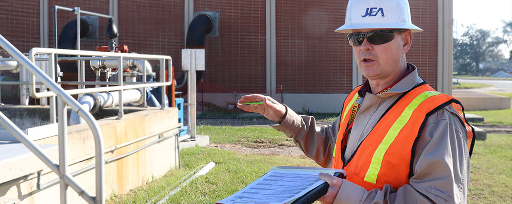 JEA Safety and Health Specialist, Curtis, explaining the wastewater facility JEA Safety and Health Specialist, Curtis, explaining the wastewater facility