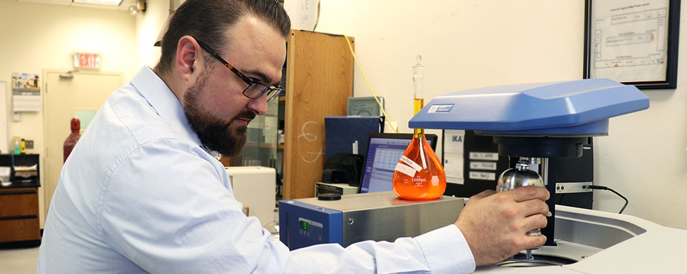 Jake analyzing fuels in the lab Jake analyzing fuels in the lab
